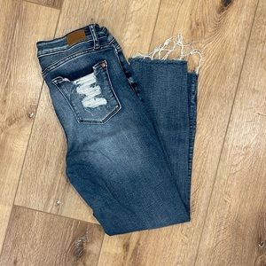 Raw hem crop, back pocket distressing only